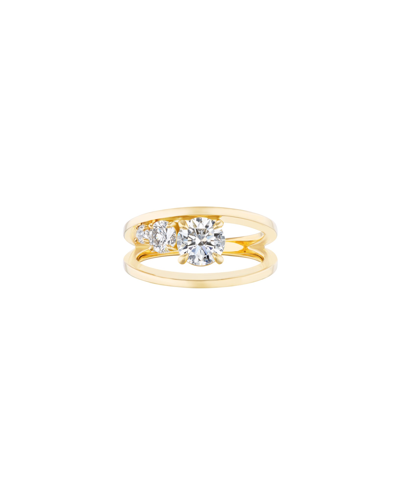 Bliss Lau empath ring in recycled 18k gold and graduating diamonds, one total carat. 