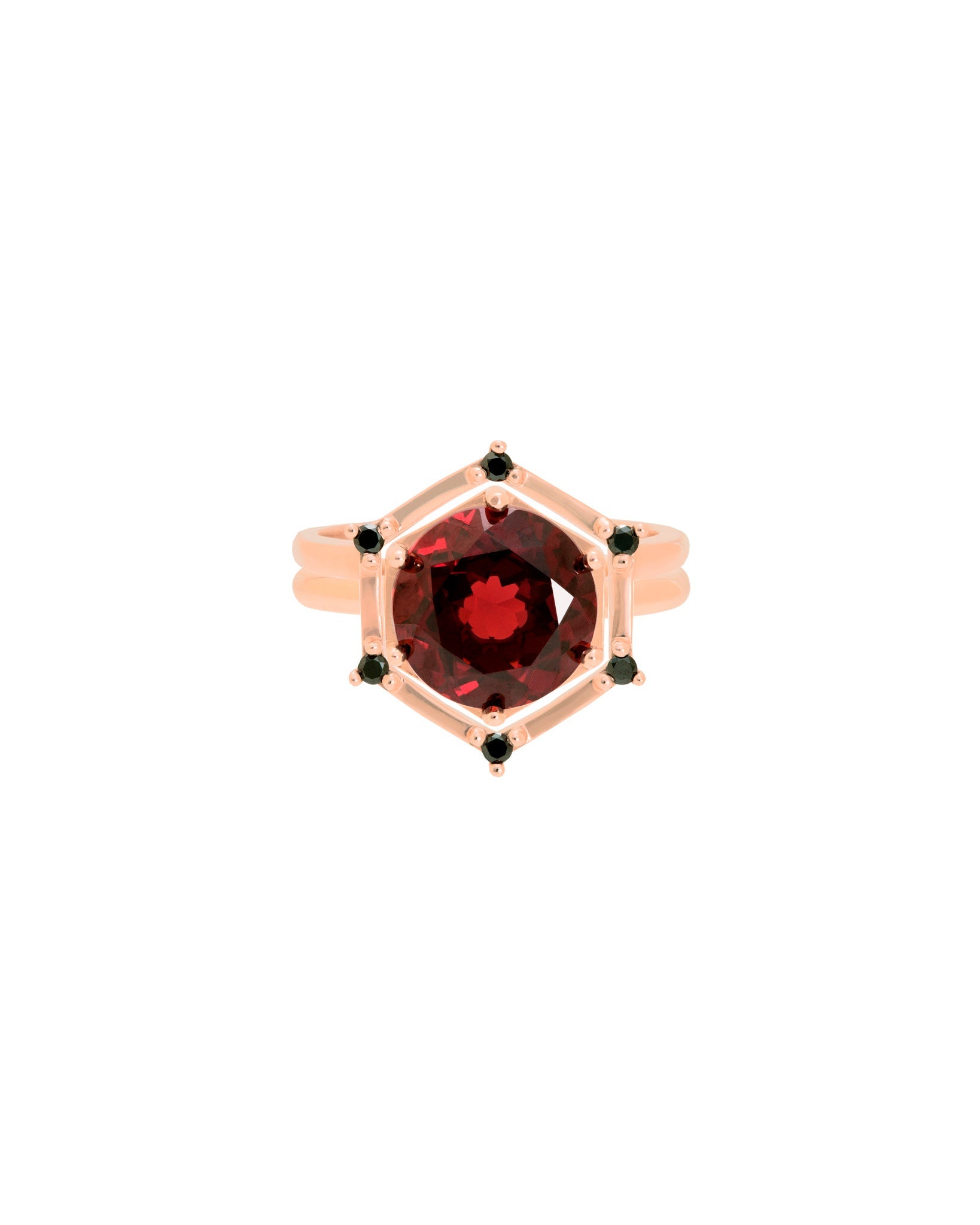 Bliss Lau interlocking ring with a red garnet center stone circled by black diamonds